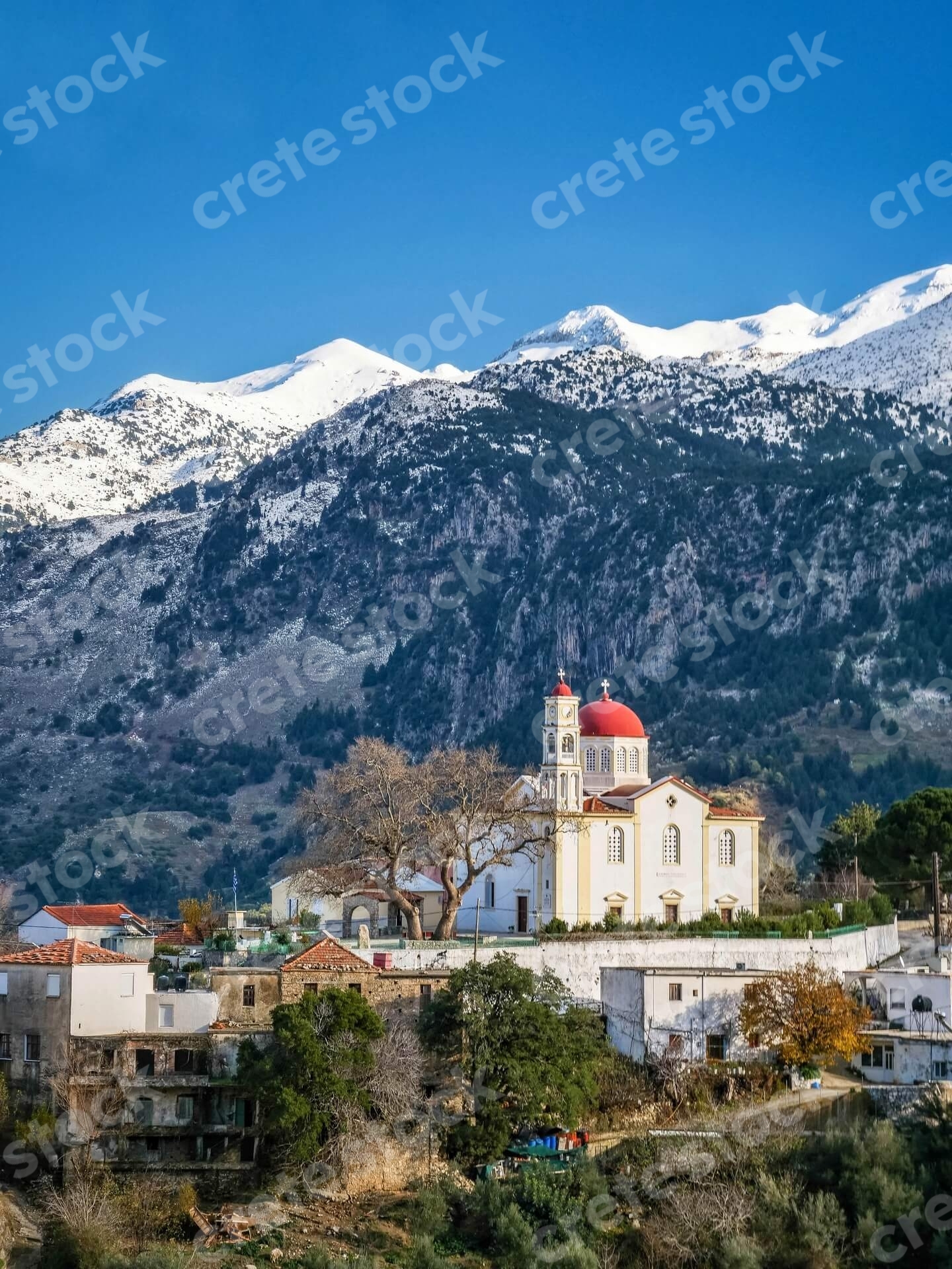 church-in-lakkoi-village-and-white-mountains-in-chania